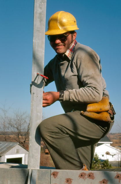 Gerry Samolyk putting on the first rib